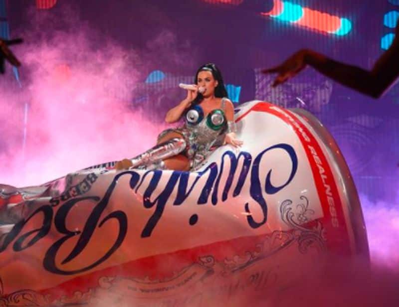 Katy Perry wears beer can bra costume pours beer from it on stage in Las Vegas dpl