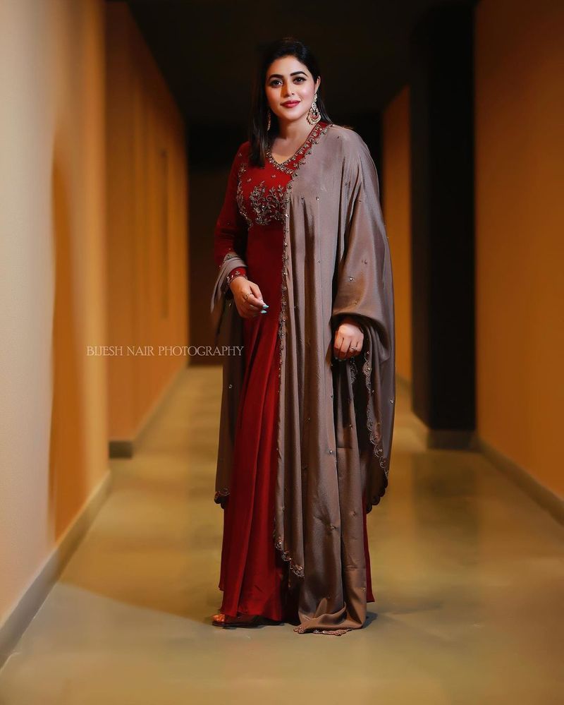 akhanda fame purna looks adorable in maroon color trendy wear
