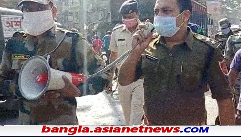 Police have distributes mask in the streets of the distrit including Kolkata in covid situation RTB