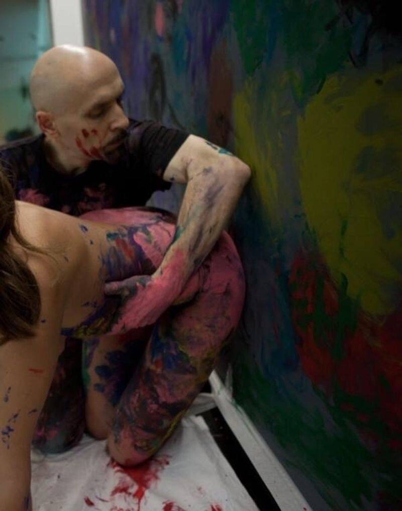 Albert Zakirov artist using naked women as paintbrush