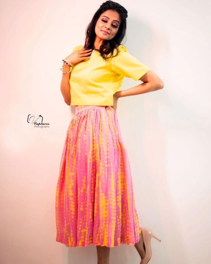 heroin priyamani stunning poses in frack netizens going crazy over her photo shoot