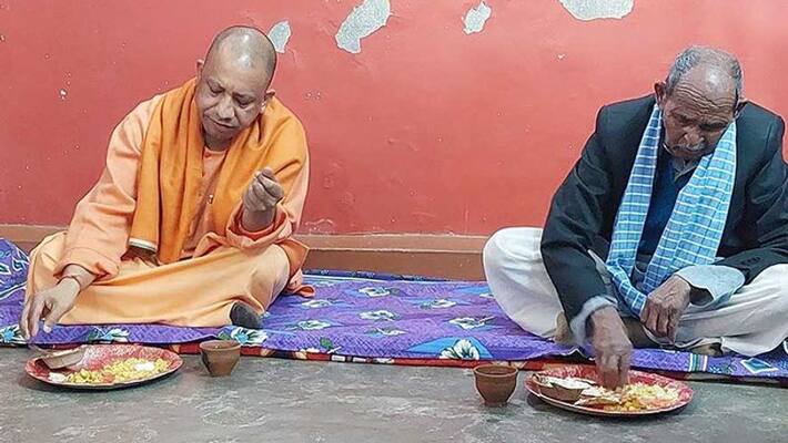 Uttar Pradesh news Chief Minister Yogi Adityanath had a meal at a Dalit household IN Gorakhpur san Uttar Pradesh news Chief Minister Yogi Adityanath had a meal at a Dalit household IN Gorakhpur san