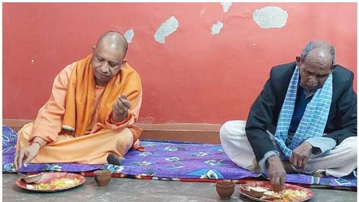 UP CM yogi adityanath eats at dalit house in gorakhpur UP CM yogi adityanath eats at dalit house in gorakhpur