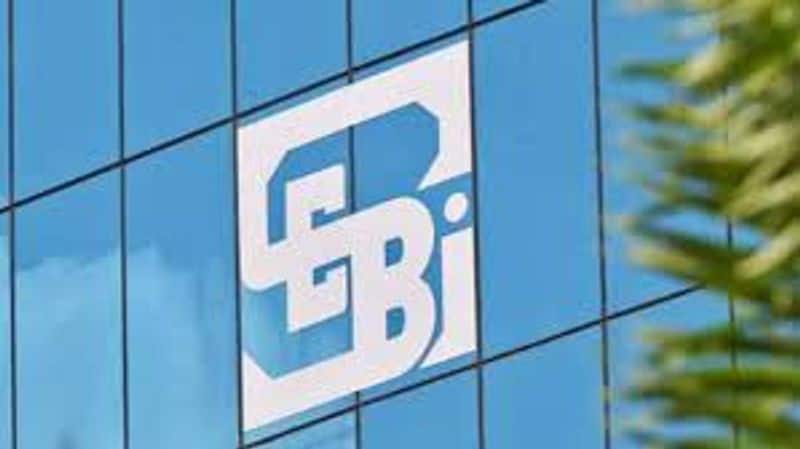 Increased monitoring of Adani Group acquisitions by market regulator Sebi: sources