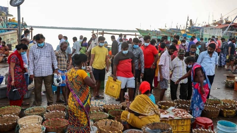 corona curfew was relaxed people flocked to the Chennai Kasimedu fish market to buy fish