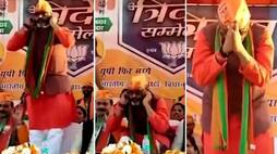UP Election 2022 Robertsganj BJP MLA abruptly starts doing sit ups during rally Watch gcw