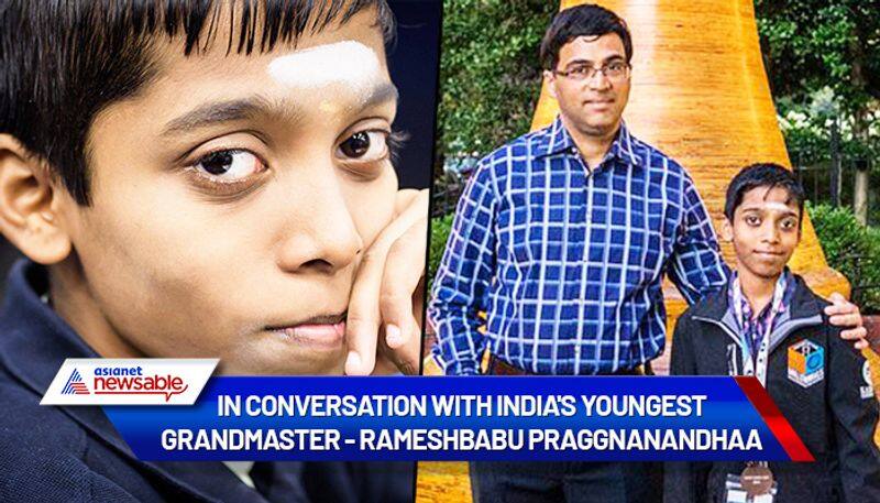 Rameshbabu Praggnanandhaa with Viswanathan Anand. Rameshbabu