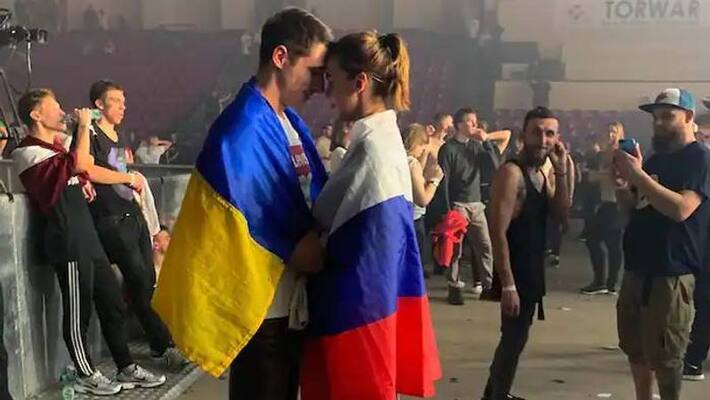 man wore Ukraine Flag woman wore russias viral image man wore Ukraine Flag woman wore russias viral image
