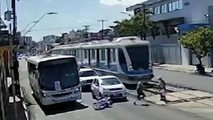 biker saves elderly woman from being hit by a tram biker saves elderly woman from being hit by a tram