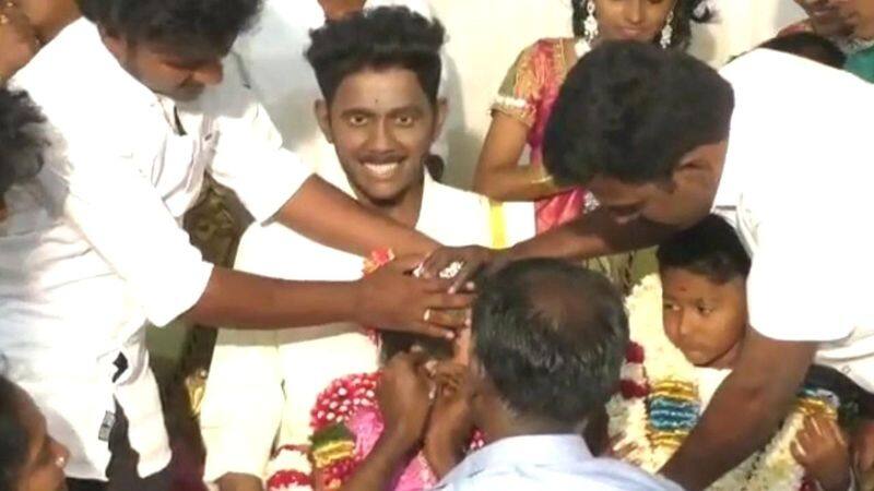 A strange earring ceremony was held while sitting on the lap of the statue of the deceased mother in Ottanchattaram