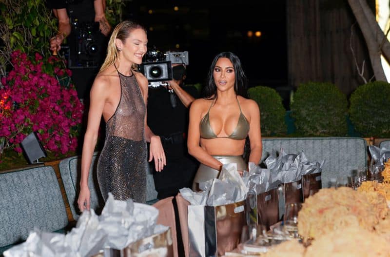 Kim Kardashian oozes hotness in silver bra in Miami with sister Khloe  Kardashian