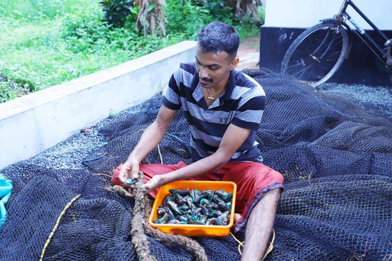 dinil prasad fish farmer who won Thozhil Sreshta award success story