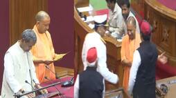 Amidst slogans of Jai Shri Ram Leader of the House Yogi Adityanath took oath  joined hands with Akhilesh Yadav and moved