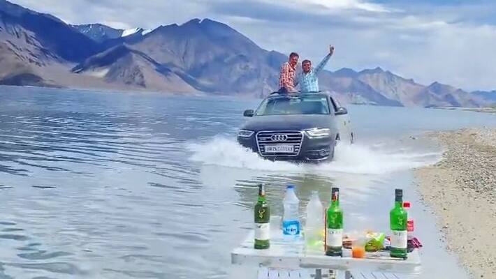 Tourists driving SUV through Ladakh s Pangong Lake irks netizens gcw Tourists driving SUV through Ladakh s Pangong Lake irks netizens gcw