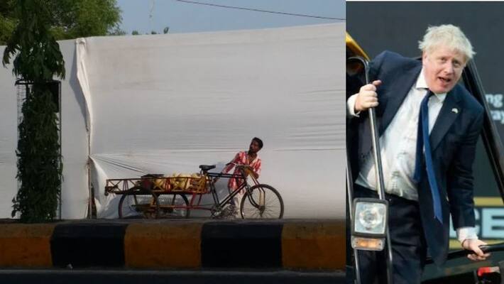 slum near sabarmati ashram gets covered ahead visit of boris johnson slum near sabarmati ashram gets covered ahead visit of boris johnson