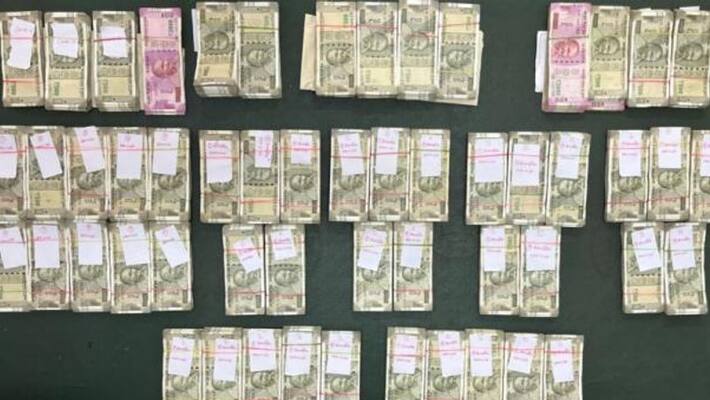 Rs 28.35 lakh seized from Coimbatore Zonal Transport Commissioner's car by Vigilance police Rs 28.35 lakh seized from Coimbatore Zonal Transport Commissioner's car by Vigilance police