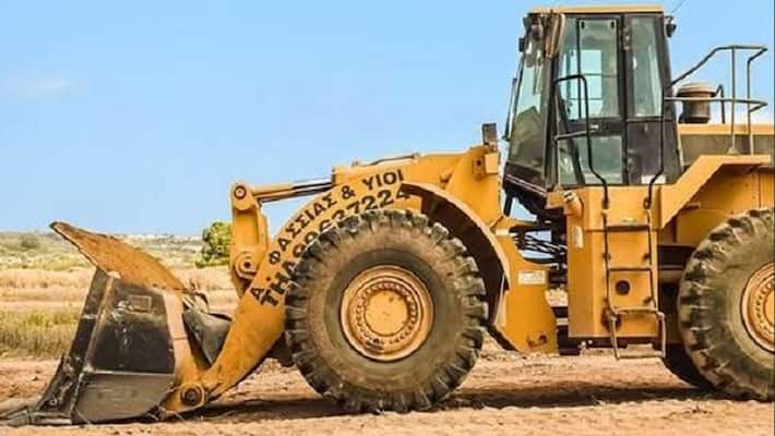 cops bring bulldozer to help woman enter matrimonial house in uttarpradesh cops bring bulldozer to help woman enter matrimonial house in uttarpradesh