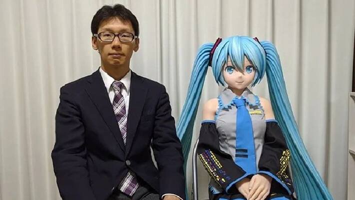 fictosexual man shares his married life with doll fictosexual man shares his married life with doll