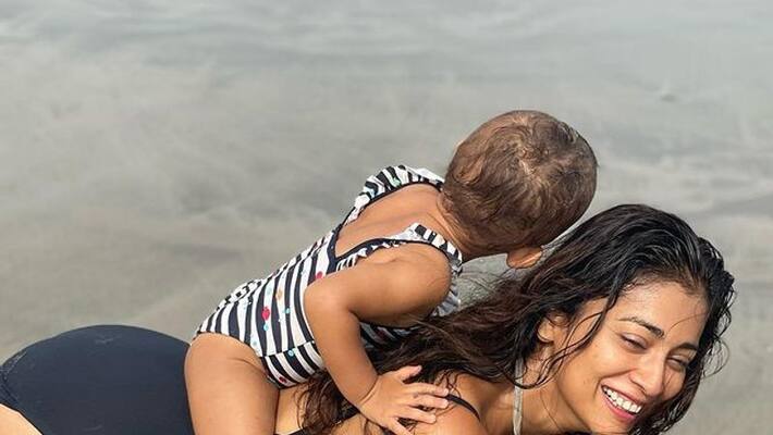 shriya saran with her daughter at vacation cute photos shriya saran with her daughter at vacation cute photos