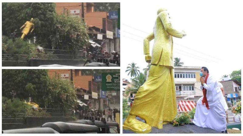 Bahubali Bhallaladeva statue broke model at Angry protesters pull down a statue of DA Rajapaksa father of Rajapaksa brothers
