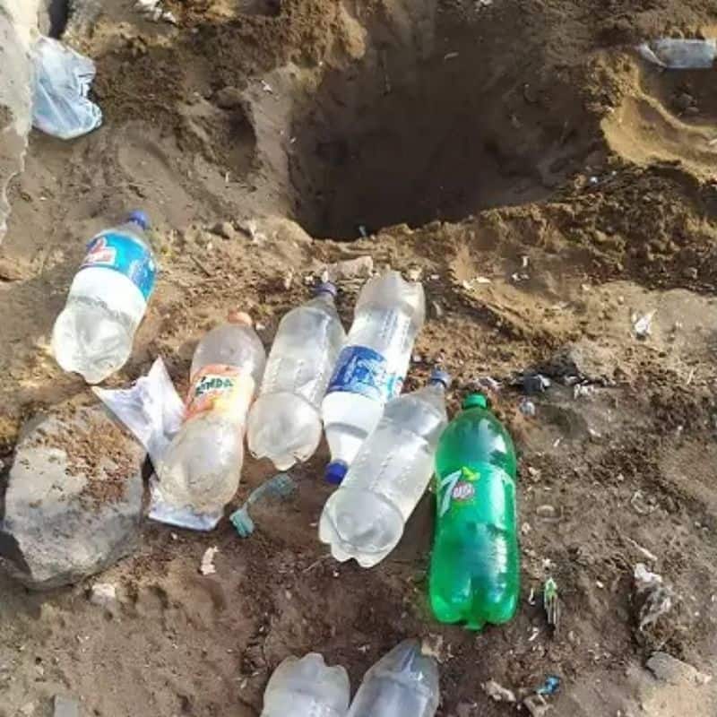 Bottles of liquor dug up at Marina Beach at chennai police shocking news 