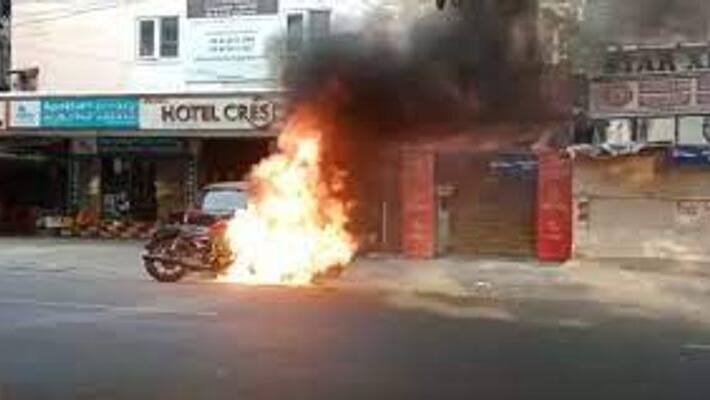 Royal Enfield Bike caught fire suddenly in Chennai Royal Enfield Bike caught fire suddenly in Chennai