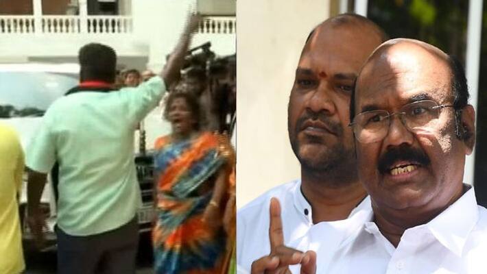 OPS supporters attack Jayakumar car OPS supporters attack Jayakumar car
