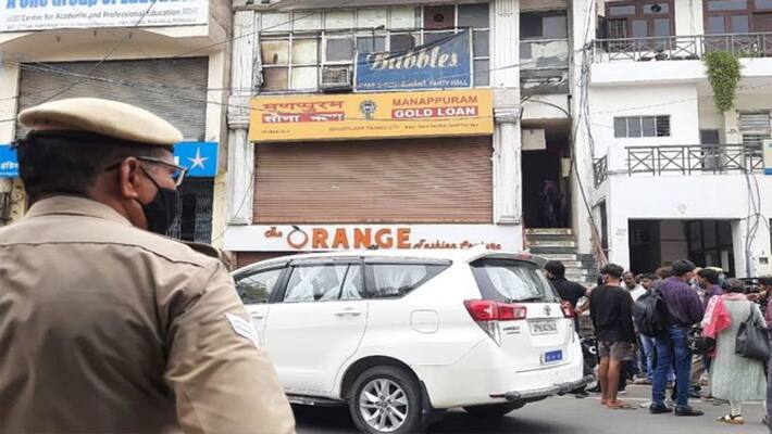 Masked men loot jewellery at gunpoint in Udaipur Manappuram Masked men loot jewellery at gunpoint in Udaipur Manappuram