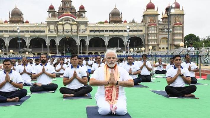 PM Modi says Yoga brings inner peace at yoga Day celebrations at Karnataka Mysuru