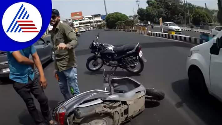 Madhya pradesh couple fall off scooter falsely accuse biker for hitting them watch what happen next akb Madhya pradesh couple fall off scooter falsely accuse biker for hitting them watch what happen next akb