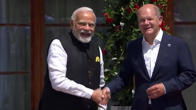 pm modi meets german chancellor olaf scholz to take part in the g7 summit