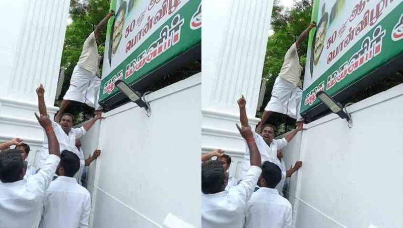 Edappadi supporters tear up OPS Baner in admk head quarters... and New banner deposit in the same place 