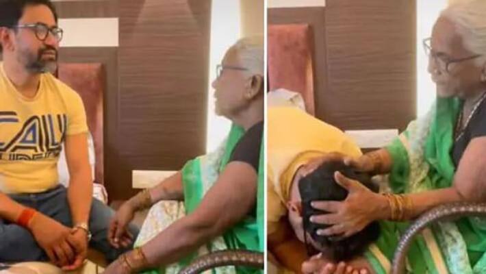 After winning Azamgarh byelection Nirhua reached home to seek blessings mother got emotional and kept head feet for 20 seconds After winning Azamgarh byelection Nirhua reached home to seek blessings mother got emotional and kept head feet for 20 seconds