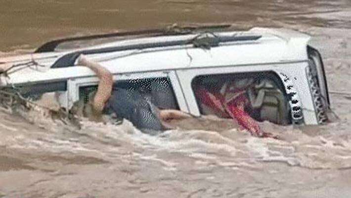 Girl washed away in stream, four others rescued after car got stuck in stream Girl washed away in stream, four others rescued after car got stuck in stream