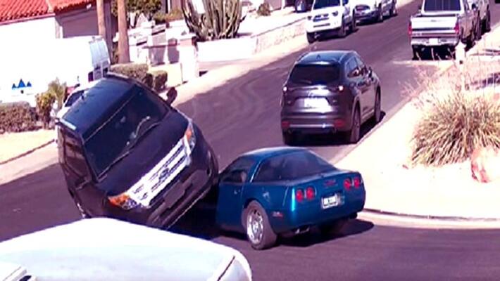 Ford Explorer Drives Over C4 Corvette Ford Explorer Drives Over C4 Corvette