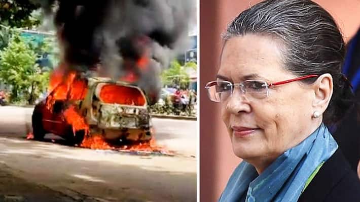 Congress workers torch vehicle in Bengaluru BJP asks Is it Satyagraha or Duragrah gcw Congress workers torch vehicle in Bengaluru BJP asks Is it Satyagraha or Duragrah gcw