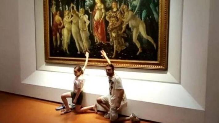 environmental activists glued hands to famous painting environmental activists glued hands to famous painting