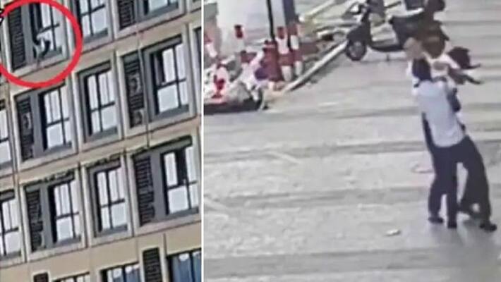 man catches child falling from fifth floors window man catches child falling from fifth floors window