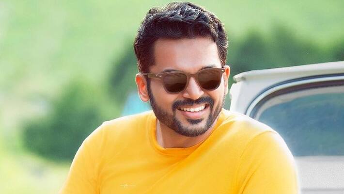 Actor Karthi darshan in meenakshi temple to win Viruman Actor Karthi darshan in meenakshi temple to win Viruman