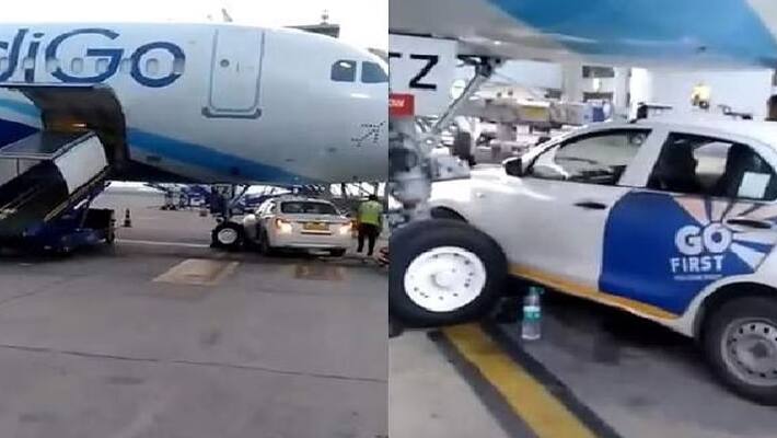 car hits indigo plane while it standing at delhi airport car hits indigo plane while it standing at delhi airport