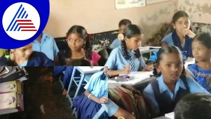 Kolar school students listening to lessons sitting in Flood water filled class room gow Kolar school students listening to lessons sitting in Flood water filled class room gow