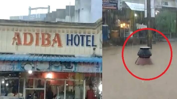 biryani pots floating in waterlogged street on hydrabad goes viral biryani pots floating in waterlogged street on hydrabad goes viral