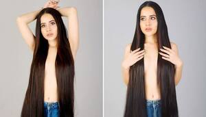Uorfi Javed poses topless for pictures; covers assets with long hair