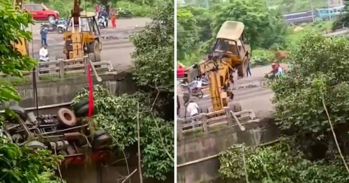 Watch Crane falls off bridge while lifting truck in Odisha