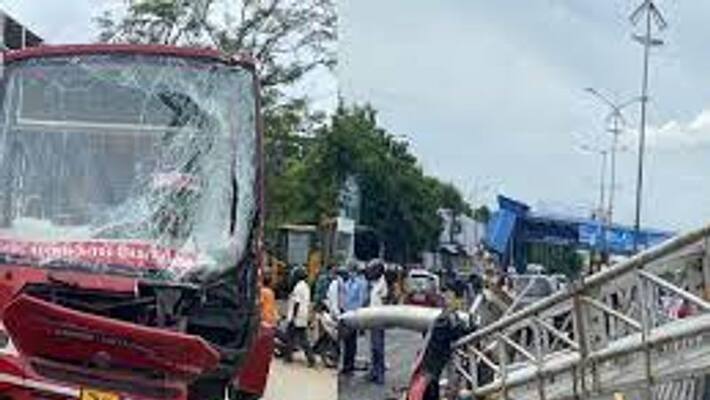 Accident near Kathipara bridge when giant sign board fell down Accident near Kathipara bridge when giant sign board fell down