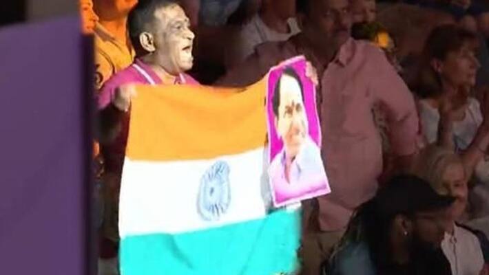 telangana sports official waves cm chandrashekar rao photo instead of gold medal winner nikhat zareen in cwg 2022 telangana sports official waves cm chandrashekar rao photo instead of gold medal winner nikhat zareen in cwg 2022