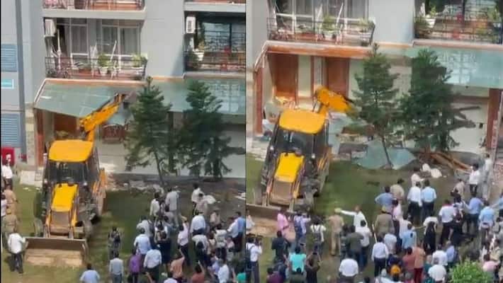 Noida civic authorities demolish illegal construction Grand Omaxe complex by self styled BJP leader Shrikant Tyagi ckm Noida civic authorities demolish illegal construction Grand Omaxe complex by self styled BJP leader Shrikant Tyagi ckm