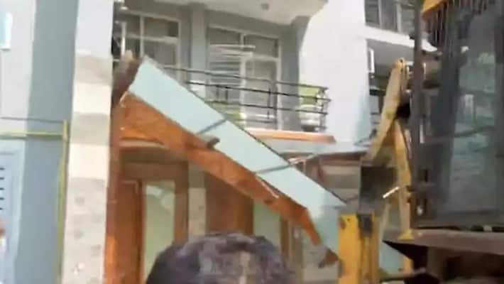 bulldozer demolishes bjp workers encroachment in noida uttarpradesh bulldozer demolishes bjp workers encroachment in noida uttarpradesh