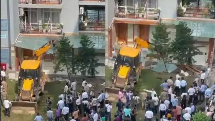 Bulldozers enter Noida housing society Shrikant Tyagi encroachments demolished vva Bulldozers enter Noida housing society Shrikant Tyagi encroachments demolished vva