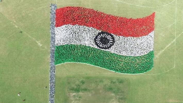 Chandigarh University students joined hands with NID Foundation created Guinness World Record for largest human image of waving flag apa Chandigarh University students joined hands with NID Foundation created Guinness World Record for largest human image of waving flag apa